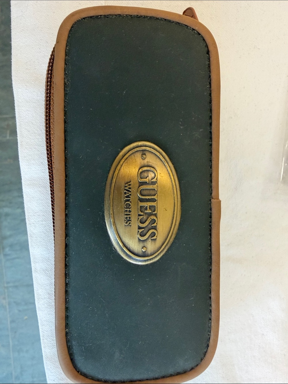 GUESS Black and Brown Travel Watch Case with Brass Logo